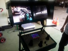 На мониторах поста управления изображения, получаемые с телекамер МРК-27-ВТ во время осмотра днища автомобиля
